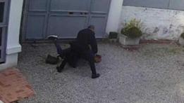 Luca Ventre bloccato a terra dalla guardia dell'ambasciata (foto d'archivio)
